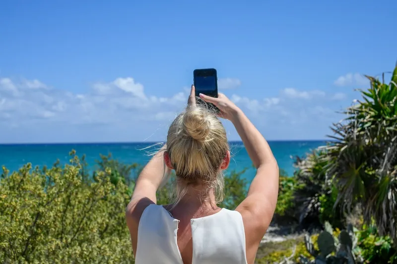 5 - Traveler with phone.webp