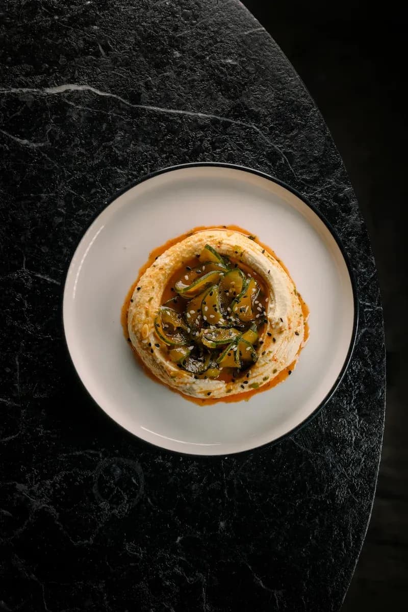 Hummus with Kimchi Smashed Cucumbers